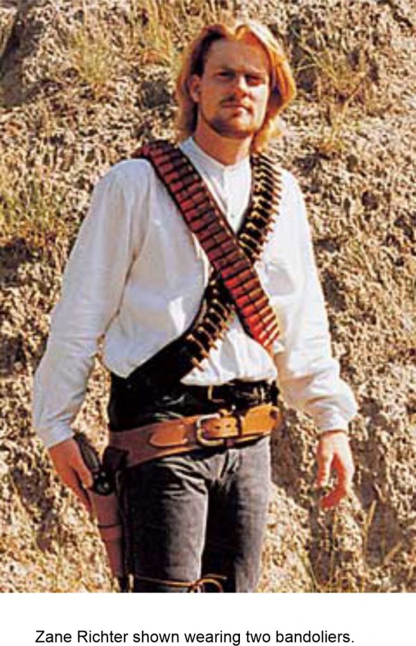 Zane Richter wearing two bandoliers