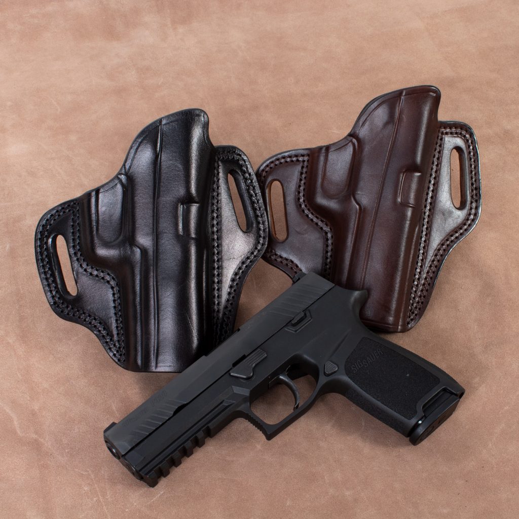 Kirkpatrick 2010 Sig P250 OWB Holster black and brown handgun